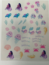 Load image into Gallery viewer, See-through edible film creating layered cake design effects