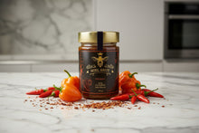 Load image into Gallery viewer, Mielbrut Hot Honey — Raw Quebec Honey with Chili Pepper Heat
