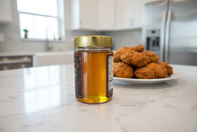 Load image into Gallery viewer, Mielbrut Hot Honey — Raw Quebec Honey with Chili Pepper Heat
