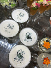 Load image into Gallery viewer, Ultra-thin edible icing toppers floating on colorful cocktails
